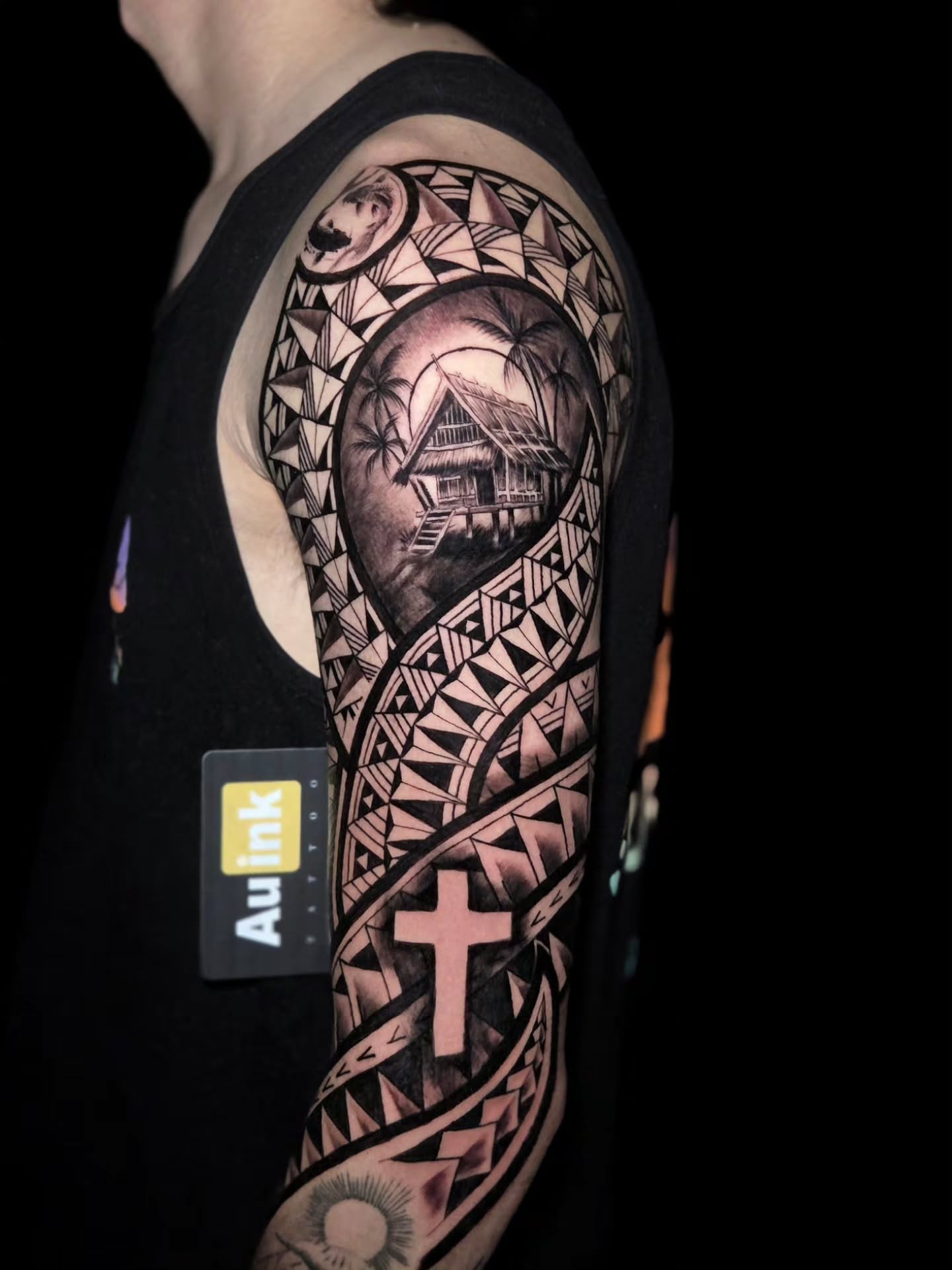 Polynesian-inspired sleeve tattoo by Aurelio Dinorog III