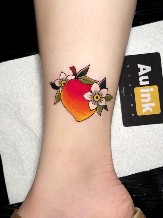 Mango & sampaguita, color & illustrative tattoo by Aurelio Dinorog III in Panglao, Bohol