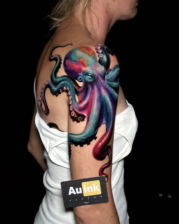 Colorful octopus, realism colored tattoo by Aurelio Dinorog III in Panglao, Bohol