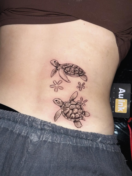 Sea turtles, island-inspired tattoo by Aurelio Dinorog III