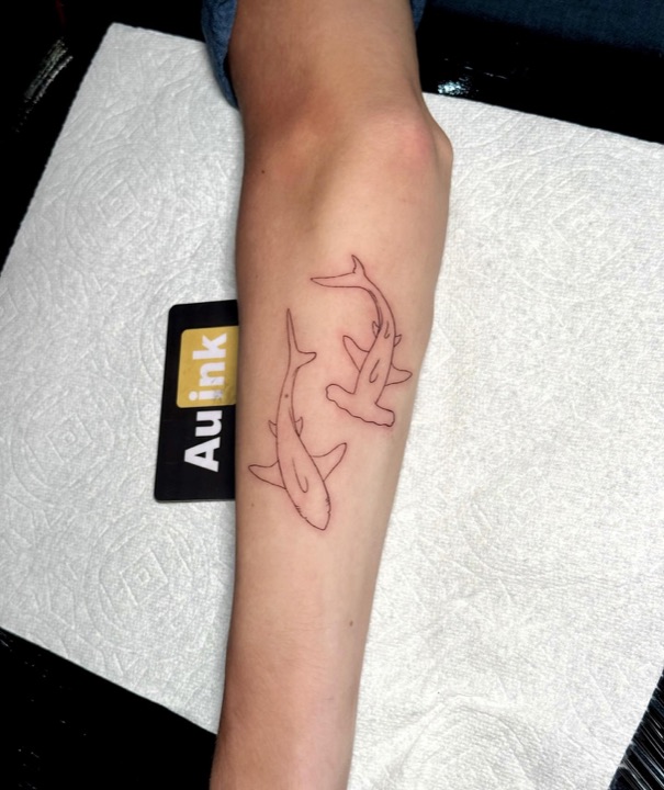 Sharks, island-inspired tattoo by Aurelio Dinorog III