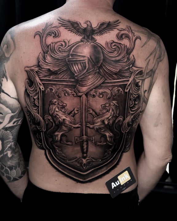 Full-back blackwork tattoo collaboration featuring Aurelio Dinorog III